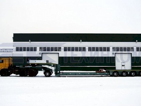 Низкорамный полуприцеп-тяжеловоз с фронтальным заездом Модель 99394F-P65