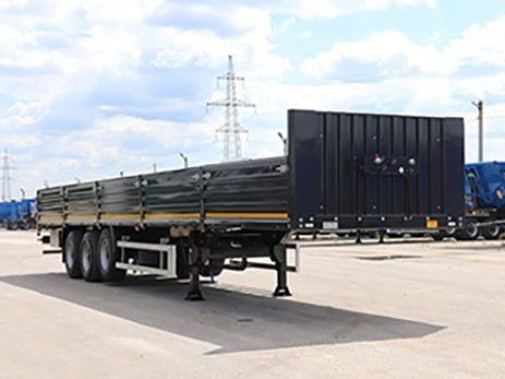 Полуприцеп бортовой Тонар B3-13/K (с кониками)